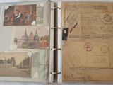 an open book with a picture of a city on it