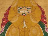 un tableau représentant une femme assise sur une chaise, une fleur à la main