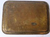 a metal tray that has a handle on it