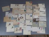 a table with a bunch of old postcards on it