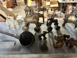 a lot of antique items that are on a table