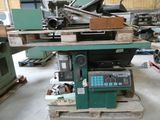 a machine that is sitting on a pallet in a warehouse