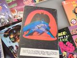 many comic books on the table together on the table