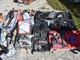 a lot of tools that are sitting on the ground