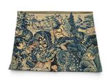 a close up of a tapestry on a white surface