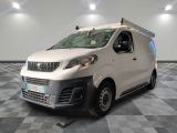 a picture of a white van on a checkered floor
