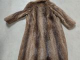 an image of a fur coat laying on the floor