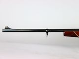 a rifle on a white background with a white background