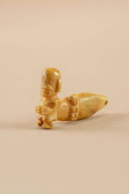 a close up of a tooth with a toothbrush in it ' s mouth