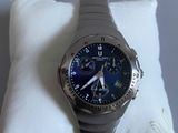 a watch that is sitting on a pillow on a table