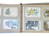 an open book with pictures of people and animals on it