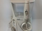 a toothbrush that is sitting on a white table