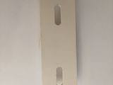 a white wall mounted device on a white wall
