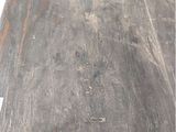 an image of a piece of wood that has been stained