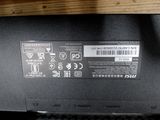 a close up of a laptop with a label on it