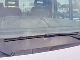a white van that is parked in a parking lot