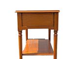 a small wooden table with a shelf underneath it