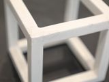 a small white object that is sitting on a table