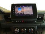 a picture of a car dashboard with a tablet on it