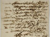 lettre manuscrite écrite à l'encre noire sur une feuille de papier