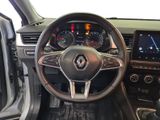 the interior of a car with a steering wheel and dashboard controls