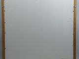 an image of a picture of a white board with holes in it