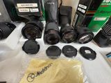 many cameras that are sitting on a table