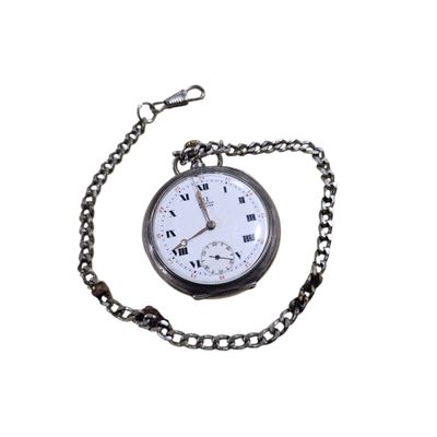 a pocket watch with a chain around it on a white background