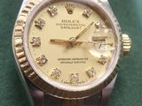 an image of a rolex watch with diamonds on the bezel