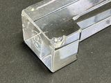 a clear box with a toothbrush in it on a table