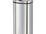 a stainless steel trash can on a white background