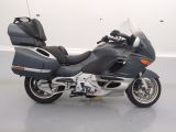 a picture of a motorcycle that is parked in a room