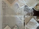 a table with a lot of doily on it