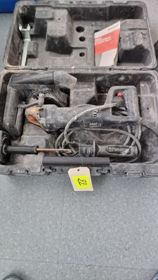 a tool box with tools in it on the floor