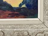 a picture of a painting in a frame on the wall