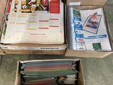 a box full of assorted items sitting on the floor