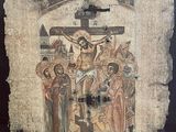 une image représentant un tableau de Jésus sur la croix, dans un cadre