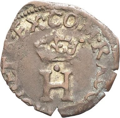 an old coin with a crown on top of it