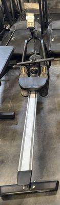 an image of a gym room with treads and machines