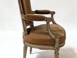 an image of a chair with a brown leather seat on a white background