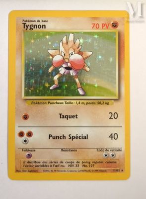 a close up of a pokemon card on a white surface