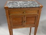 an image of a small wooden table with a marble top