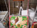 a cart that has some kind of food inside of it