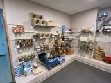 a room with shelves filled with various types of food