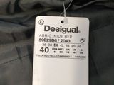 a close up of a label on the back of a jacket
