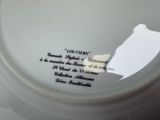 a close up of a plate with a quote on it