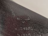 une image montrant un gros plan d'un couteau posé sur une table
