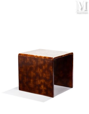 the side table is made of wood and has a marble top
