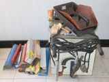 a pile of tools sitting on top of a box