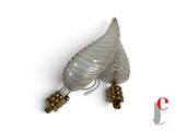 a pair of glass wings that are attached to a wall